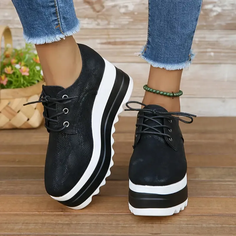 Elegante plateausneakers van slangenleer